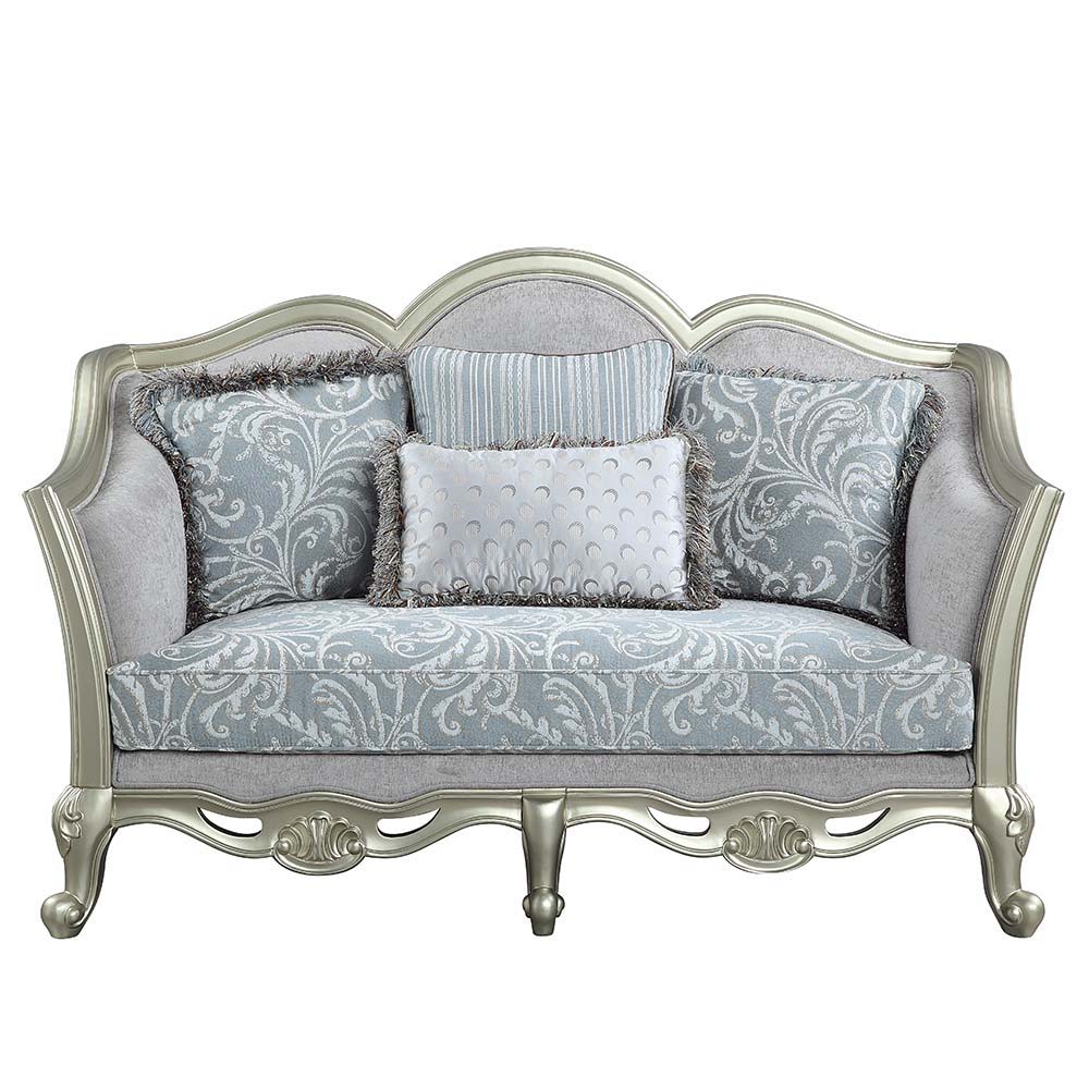 With a timeless silhouette influenced by French beauty, this Qunsia sofa makes a gracious statement in a comforting light gray linen upholstery fabric. Delicate curves invite the eye, while cabriole legs the champagne wooden trim that adds visual impact. 
