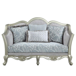  this Qunsia sofa makes a gracious statement in a comforting light gray linen upholstery fabric. Delicate curves invite the eye