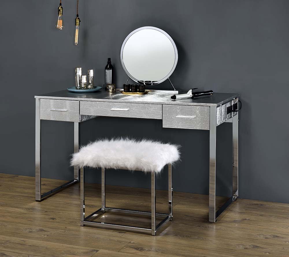 Make getting ready for a night out on the town fun with the Van chrome vanity set. From the beautifully faux crock textured case to the sturdy shiny chrome base make this a statement piece. The three ample drawers have enough room for beauty tools and sup
