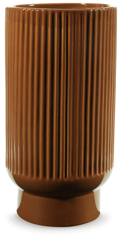 This ceramic vase makes a relaxed style statement. Its casual design and earthy burnt umber glaze complement your laid-back sensibilities. Delightfully simple and simply delightful, this vase subtly wows on its own or when filled with your favorite flower