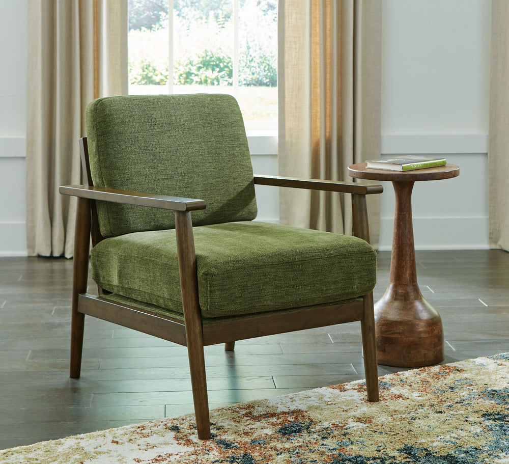 Feed your mid-century modern nostalgiaâ€”with a contemporary twist. A vibrant trend-right hue and comfy feel make this accent chair perfect for lounging solo or with friends and family. Its linear profile adds plenty of fresh style, and the tapered accent