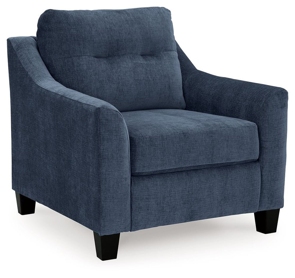 Urban contemporary meets mid century (with a pop of trend-right color) in this chair. Supremely soft upholstery, teeming with luster and movement, finesses the piece with just the right touch. Gently flared arms and tufted back cushions let you bask in th