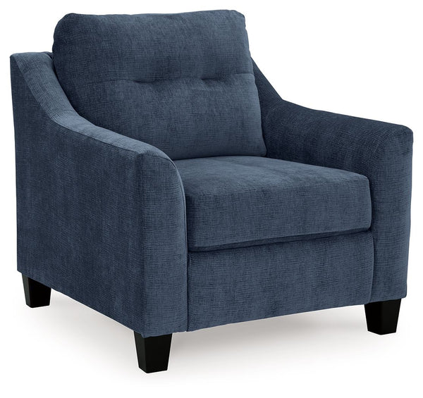  finesses the set with just the right touch. Gently flared arms and tufted back cushions let you ba