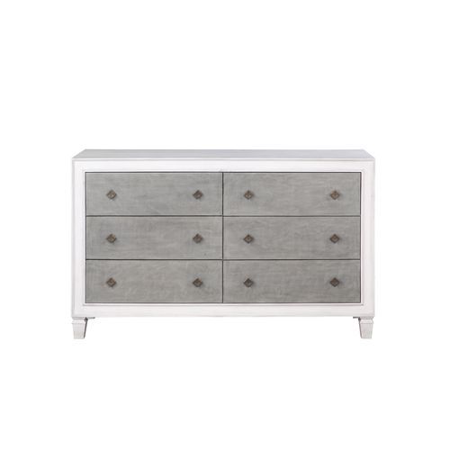 The Katia collection is perfect for creating a modern rustic or farmhouse aesthetic. Merging old and new design features and finishes. The bed features a channel-tufted headboard and footboard in gray linen that pops against the white frame. The case good