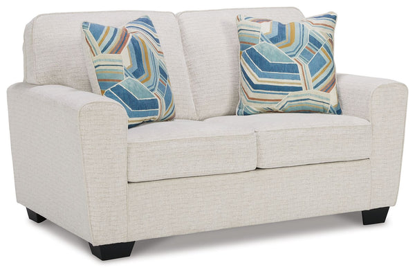 Need a simple style refresh? Liven up your living room essentials with this loveseat. A chunky silhouette holds invitingly ample cushioning you-'ll long to lounge in. Crosshatched upholstery and accent pillows give the otherwise casual design a delightful