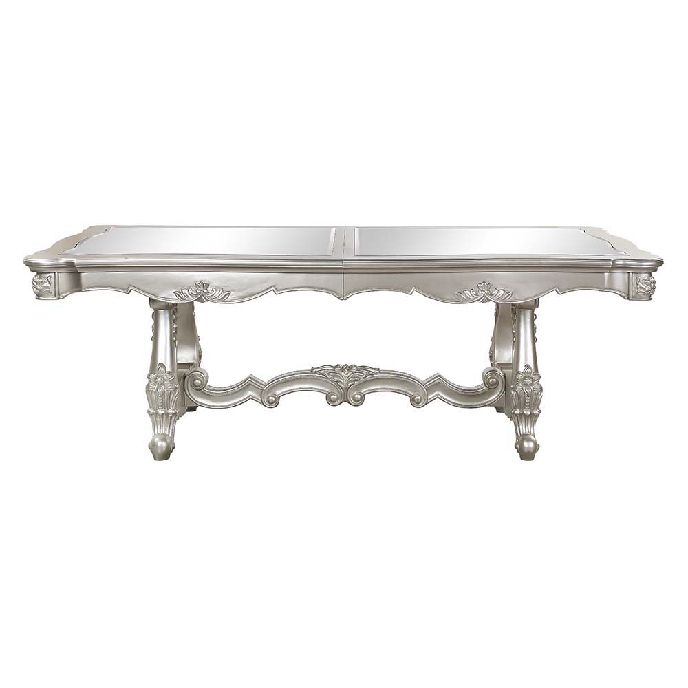 An ode to traditional glamour, the Devayne double pedestal dining table brings in all the allure and charm that you are seeking for a dining table. The table features an extension leaf that allows for additional dinner guests. The champagne finish enhance