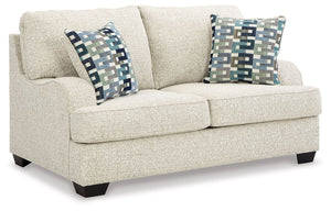 This loveseat has the corner on casual contemporary style and everyday comfort. Chic and subtly innovative, its crosshatched chenille upholstery is a forward-thinking take on fashionable neutrals. The sleek frame gets a soft, streamlined touch with slopin