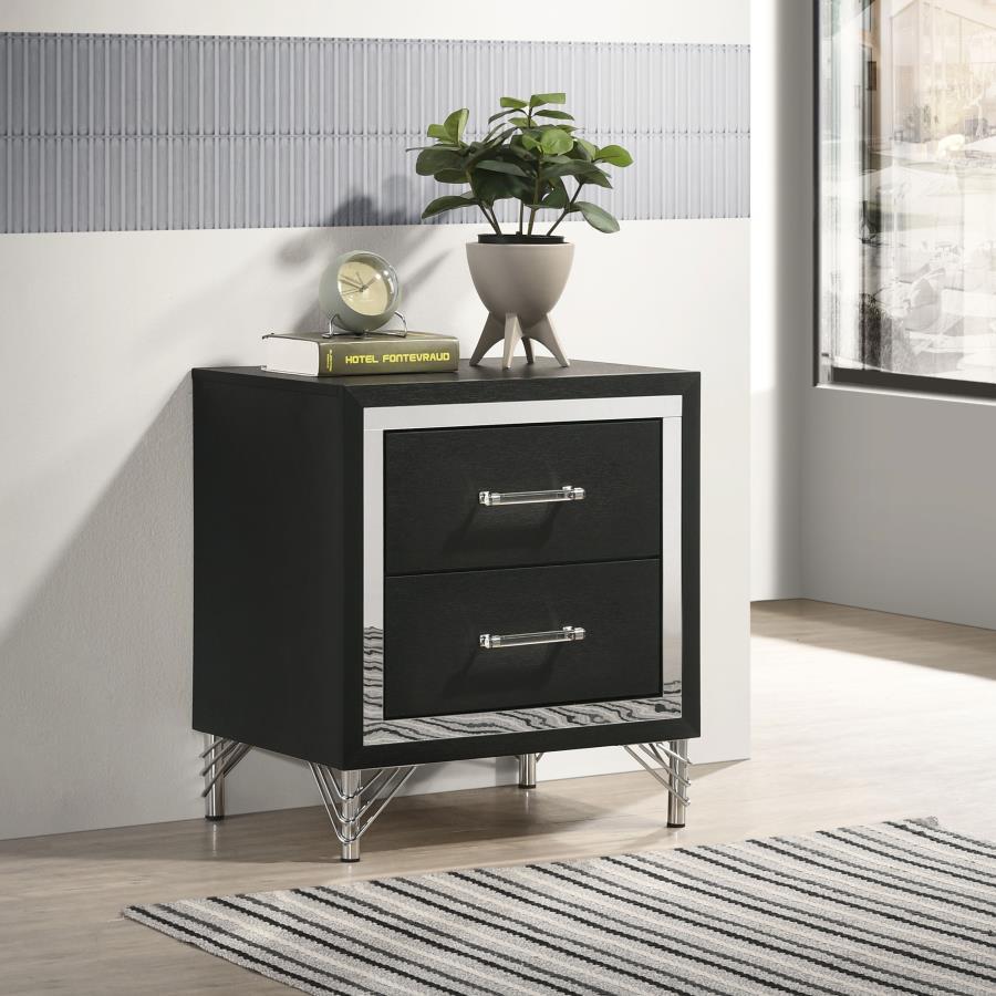 Gleaming chrome trim captures attention on a modern two-drawer nightstand. Perfect for your sophisticated bedside, it boasts a bold black finish case that offers the perfect touch of depth with its chrome trim. A pair of long bar pulls decorate drawer fro