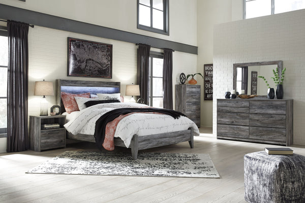 Baystorm - 7 Pc. - Dresser, Mirror, Chest, Queen Panel Bed, 2 Nightstands - Gray