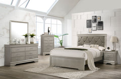 This bedroom set embodies a refined elegance with its soft silver hue and luxurious textures, perfect for creating a serene and sophisticated sanctuary. The centerpiece is a sumptuous bed framed by a headboard with diamond-tufted detailing, offering a tou
