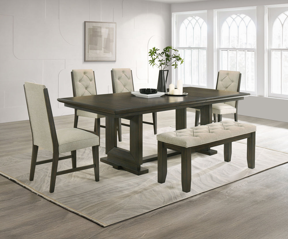 Bring a perfect blend of style and comfort to your dining space with this beautifully designed set. Featuring a sleek, dark-finished table with a sturdy trestle base, it provides a durable and inviting surface for everyday meals and gatherings. The uphols