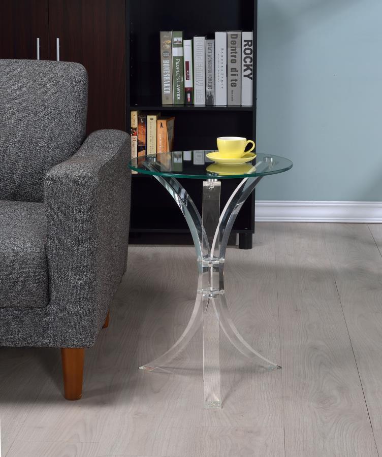 This contemporary side table exudes sophistication with its clear acrylic legs and tempered glass top. The round top is crafted from durable, scratch-resistant tempered glass, offering a sleek and practical surface for your living space. The clear acrylic