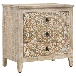 An ornate medallion brings boho charm and artisan character to a farmhouse accent cabinet. Easily doubling as a side table, the cabinet features three drawers perfect for tucking away essentials and accessories in a tidy living area or bedroom. A whitewas