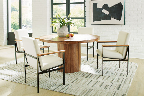 Urban Contemporary design. Made with solid Shesham wood, veneer and MDF substrate. Finished in a clear natural wood tone to enhance the rich natural beauty of the wood. Round dining table features a thick solid wood top set on a sturdy round pedestal for 