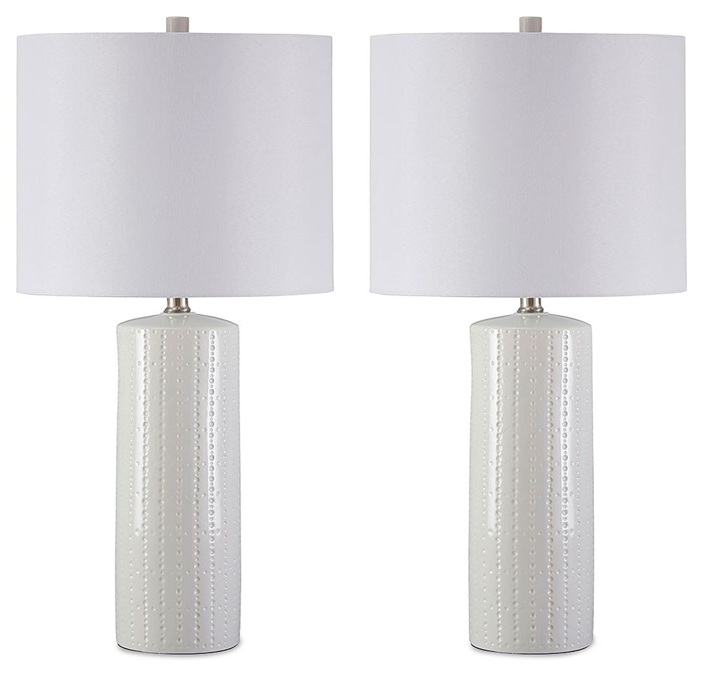 Its base teeming with texture, this ceramic table lamp proves that a monochromatic design can still be visually interesting. The clean lines and crisp finish are quintessential contemporary.<br><br><b>Additional Dimensions</b><br><ul><li>Shade: 0-"</li><l