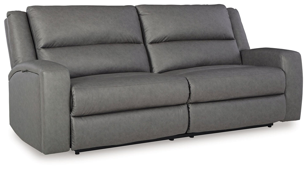 This reclining sofa appeals to your love for feature-filled furniture, all while maintaining a clean-lined and contemporary design. Pop-out storage and cup holders keep essentials close when you need them and tuck away easily when you donâ€™t. Time to rec