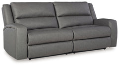 This reclining sofa appeals to your love for feature-filled furniture, all while maintaining a clean-lined and contemporary design. Pop-out storage and cup holders keep essentials close when you need them and tuck away easily when you donâ€™t. Time to rec