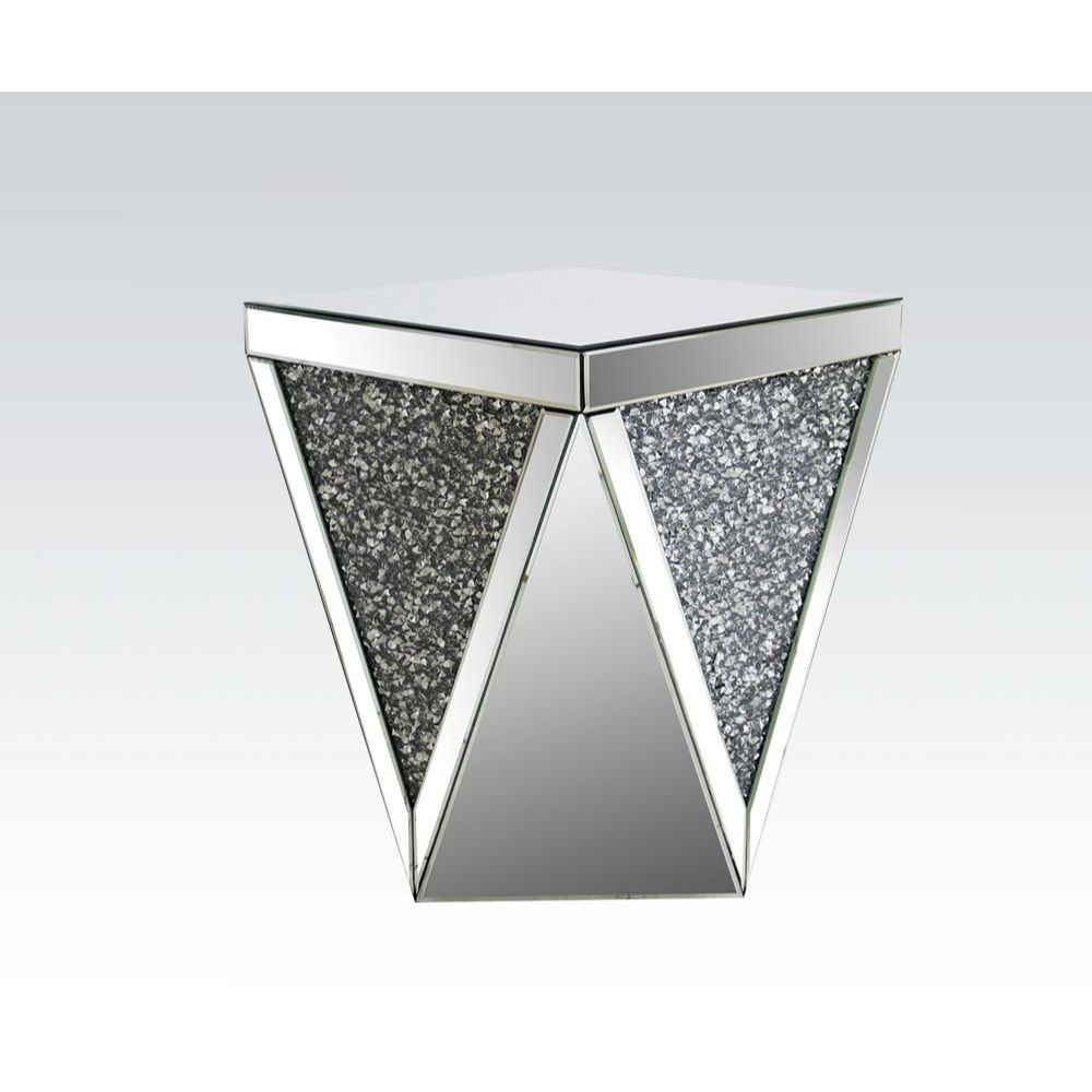 The Noralie mirrored occasional table will add a modern glam style to your living room. This drum table features a sleek and unique style with its square top, triangular base, and acrylic inserts. Add this coffee table to any room to add to add style and 