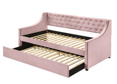 The fully upholstered daybed embodies a classic aesthetic infused with rich textures. Wooden frame is graced with gentle curves and elegant details while button-tufted velvet upholstery makes you indulge in a luxurious comfort. An additional trundle under
