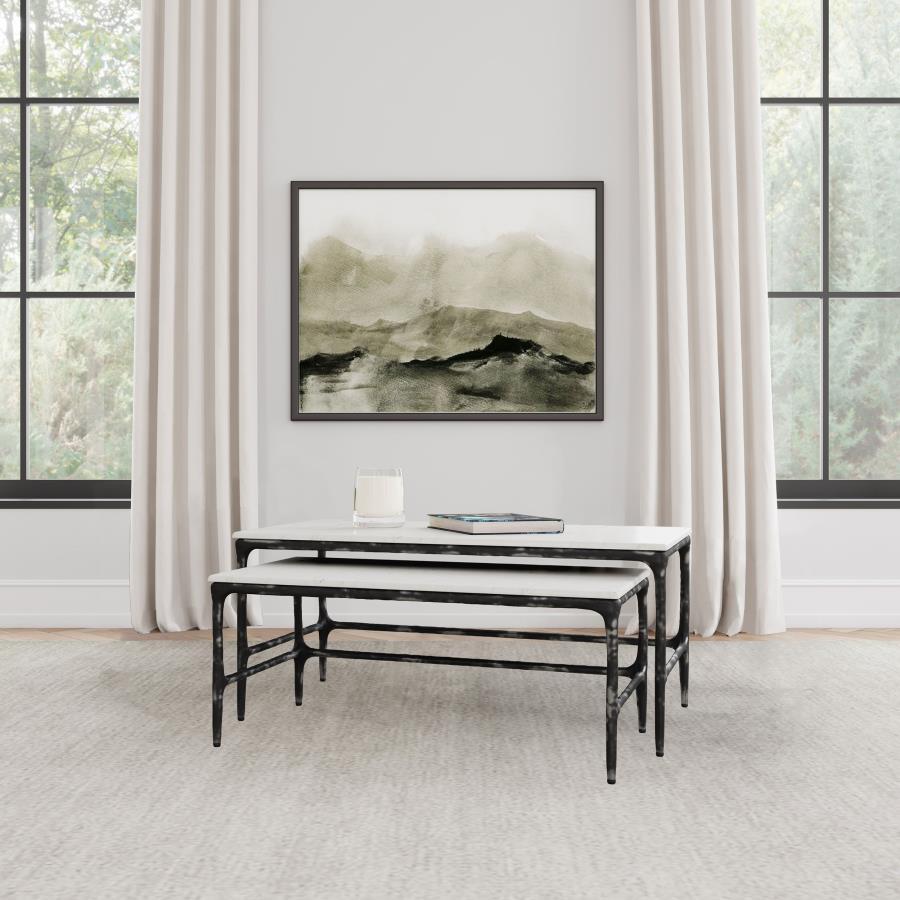 This two-piece nesting set introduces a refined center table solution. Arrange them as a cocktail table ensemble, or separate them to function as a versatile accent table. Each low table includes a genuine marble surface and an antique black iron frame, r