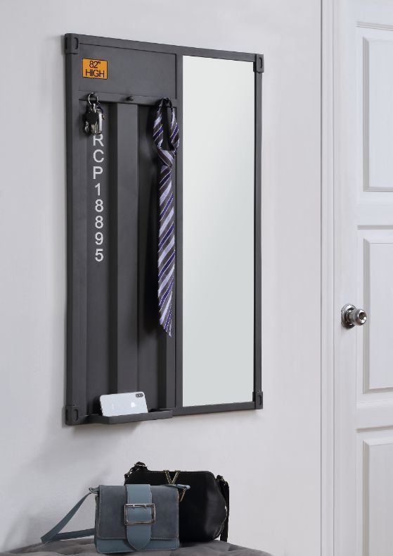 Bold industrial accents exude a funky New York loft vibe that makes an immediate impact to your space. The Cargo Mirror embodies true industrial design with warehouse style. It features a unique shipping container look panel with gunmetal finish enhancing