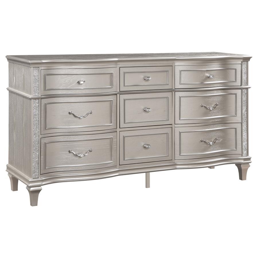 A silver oak finish creates an elegant touch to this glam nine-drawer dresser. Hexagon-shaped knobs and drop bail handles appointed with pearl accents adorn each of the nine spacious drawers for a luxurious look and feel. Keep delicate essentials organize