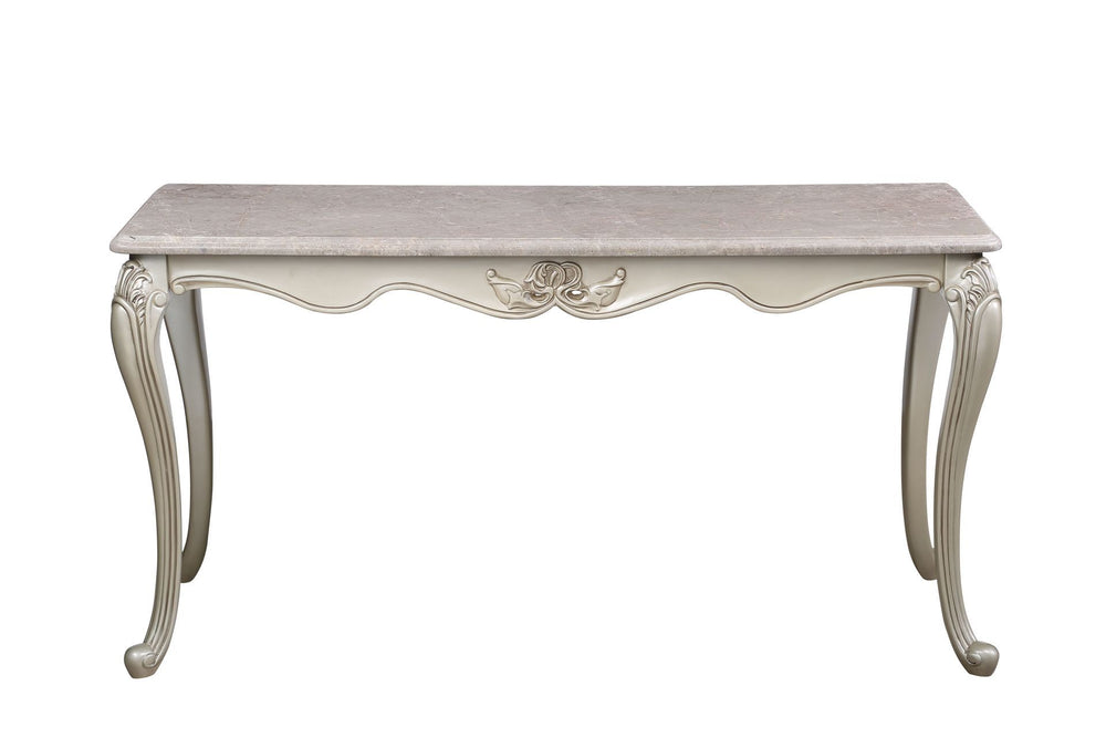 The Monique Royal Classic Console/Entry Table in champagne exudes heirloom-quality craftsmanship and timeless elegance. Expertly constructed from premium pine solids and adorned with durable polyurethane carvings, this table is lightweight, moisture-resis