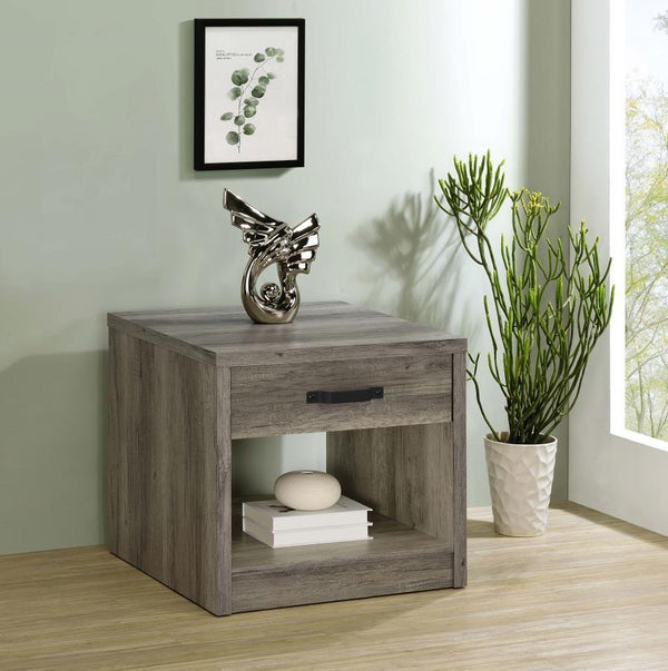  it delivers a natural wood-look design. The table includes a spacious drawer with a bold 