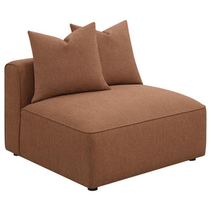 Elevate your modern seating area with this contemporary modular armless chair, upholstered in a soft terracotta trillium polyester blend fabric across its tailored tight back, thick cushion and matching throw pillows. Self-welt trim along the seat edge an