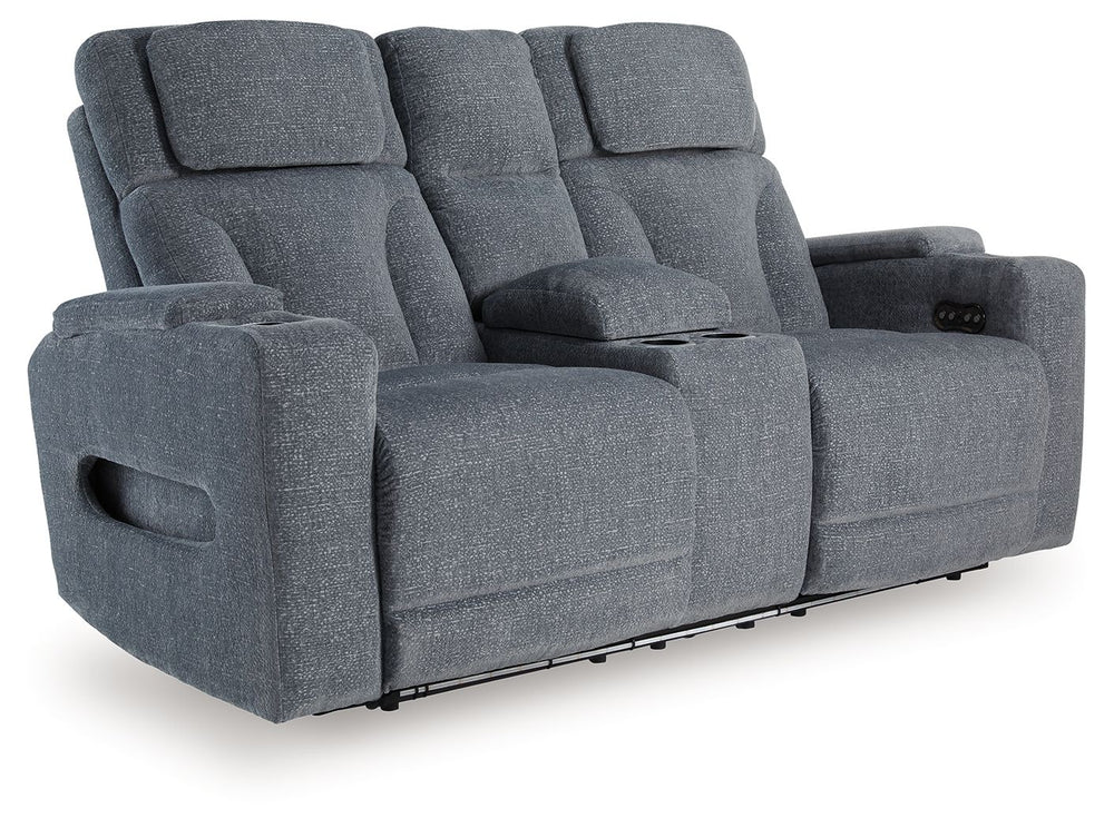 Chill-out time has never looked better. This power reclining loveseat-'s adjustable headrest ensures a perfect view of the TV no matter how far back you recline, while the extended ottoman takes your comfort to the next level. Handy charging features and 
