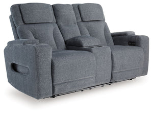 Chill-out time has never looked better. This power reclining loveseat-'s adjustable headrest ensures a perfect view of the TV no matter how far back you recline, while the extended ottoman takes your comfort to the next level. Handy charging features and 