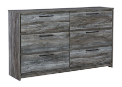 Beachy style and lots of storage go hand in hand with this dresser. Its driftwood and surfer-inspired smoky finish creates a rustic look that-'s perfect for setting the scene of an island getaway. Six roomy drawers give you the space needed for stowing aw