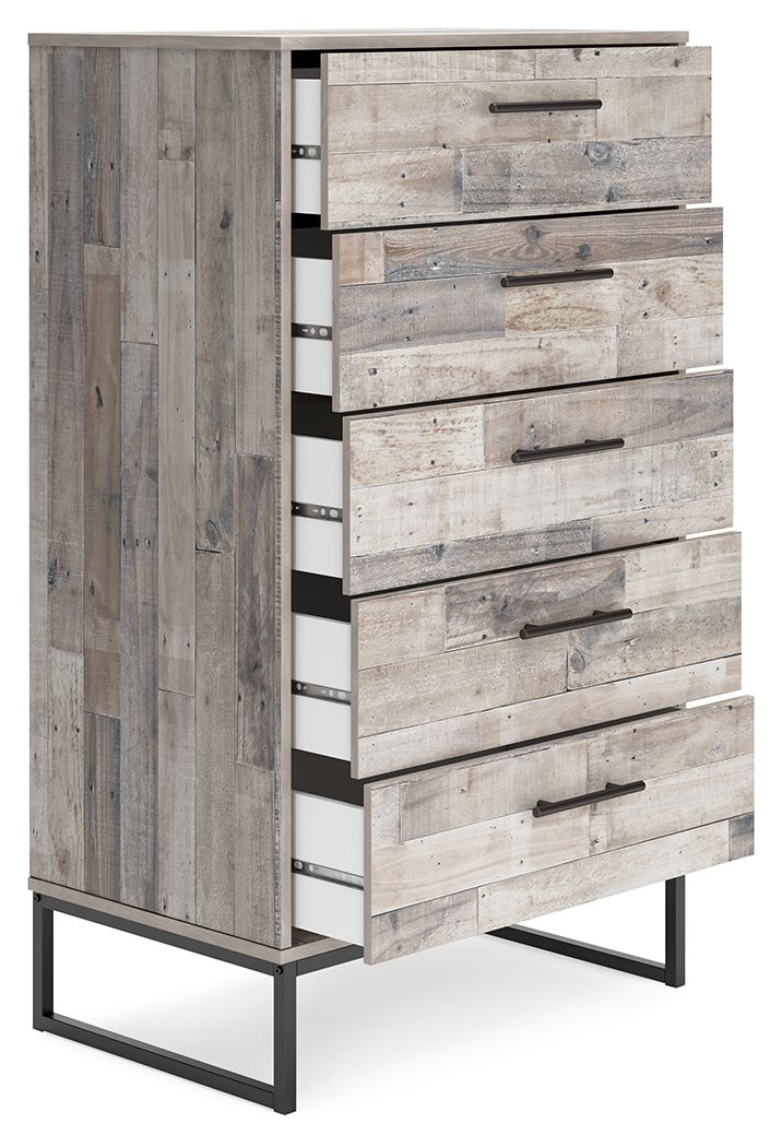 Part beach chic, part urban hip, this chest of drawers is everything you dreamed of, at a comfortably cool price. The butcher block whitewash finish over replicated pine grain lends a richly relaxed aesthetic that suits your sensibility. Dark pewter-tone 
