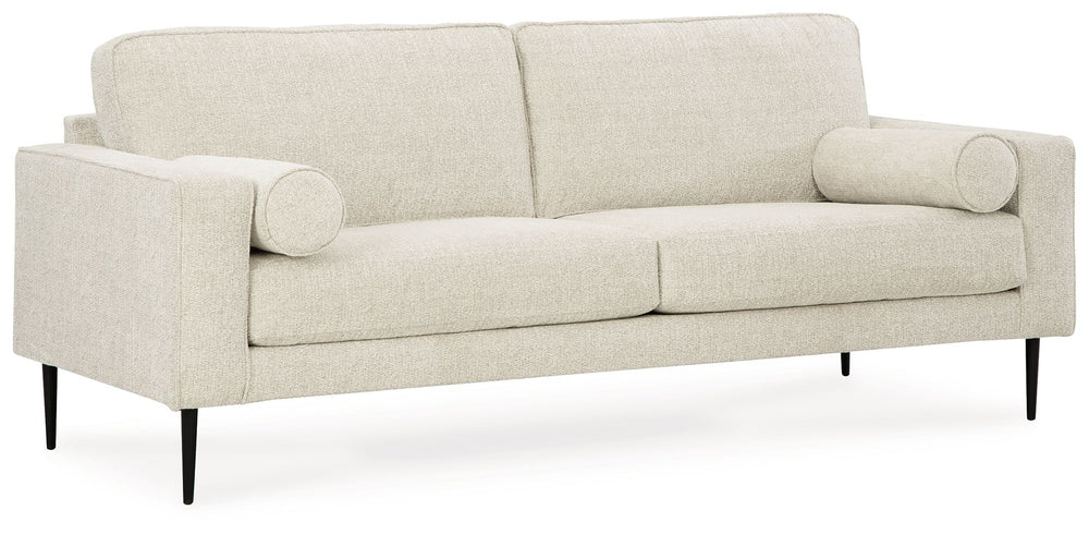 Simple comfort meets modern function in this living room set. An apt addition to apartments and other small spaces, the slim-profiled piece welcomes you with its cozy character. A subtle chevron pattern on the cushions refreshes the classic neutral hue, e