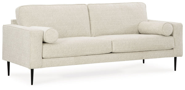  the slim-profiled piece welcomes you with its cozy character. A subtle chevron pattern on the cushions refreshes the classic neutral hue