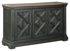 Invite your family into the heart of your home with this dining room server. Its beautifully textured black finish and timeworn planked oak top create a unique two-tone contrast. A charming lattice design graces the front of the doors. Thick pilasters add