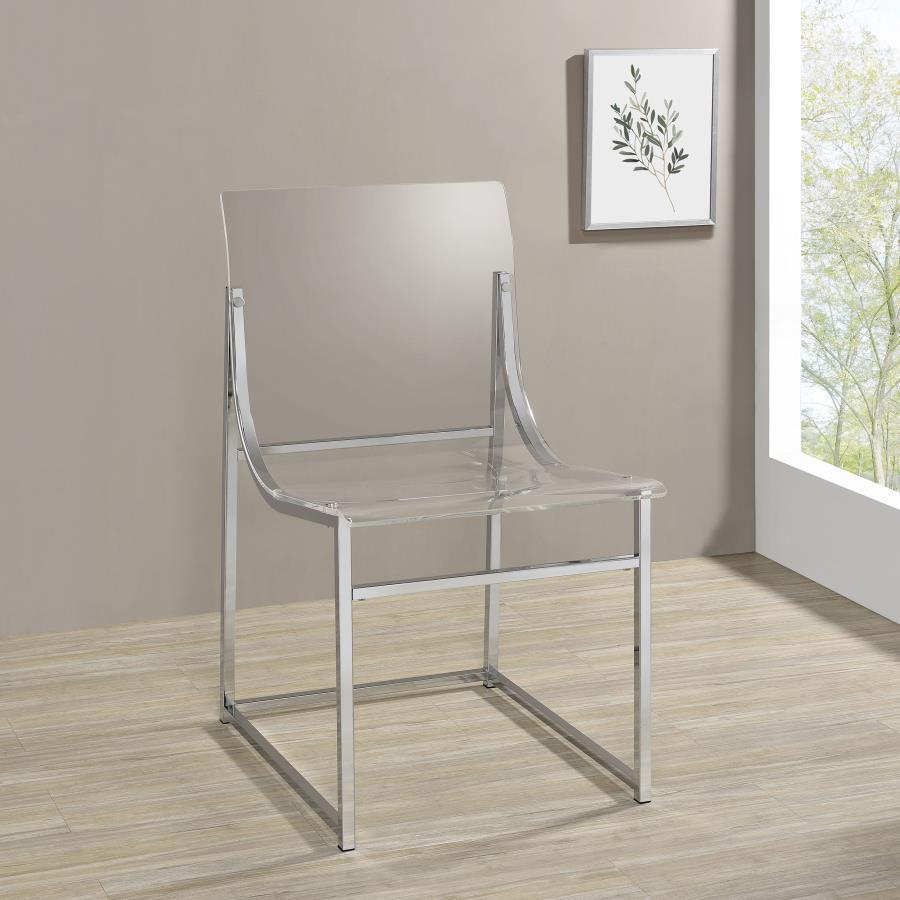 Spin up a stylish, modern refresh for your dining table with a set of two contemporary side chairs. Clear acrylic and graceful curves create a comfortable, minimalist seat and back, offering comfort that dresses up or down to suit your space. Each chair i