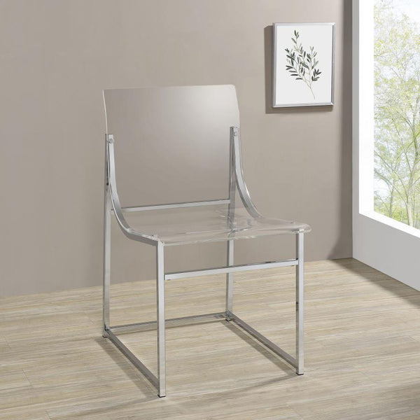  modern refresh for your dining table with a set of two contemporary side chairs. Clear acrylic and graceful curves create a comfortable