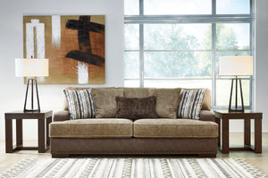  this sofa is perfect for those who love the look of leather. Two textural tones provide twice the style and comfortâ€”and incorporate an added layer of visual interest. Throw pillows add a fun decorative eleme