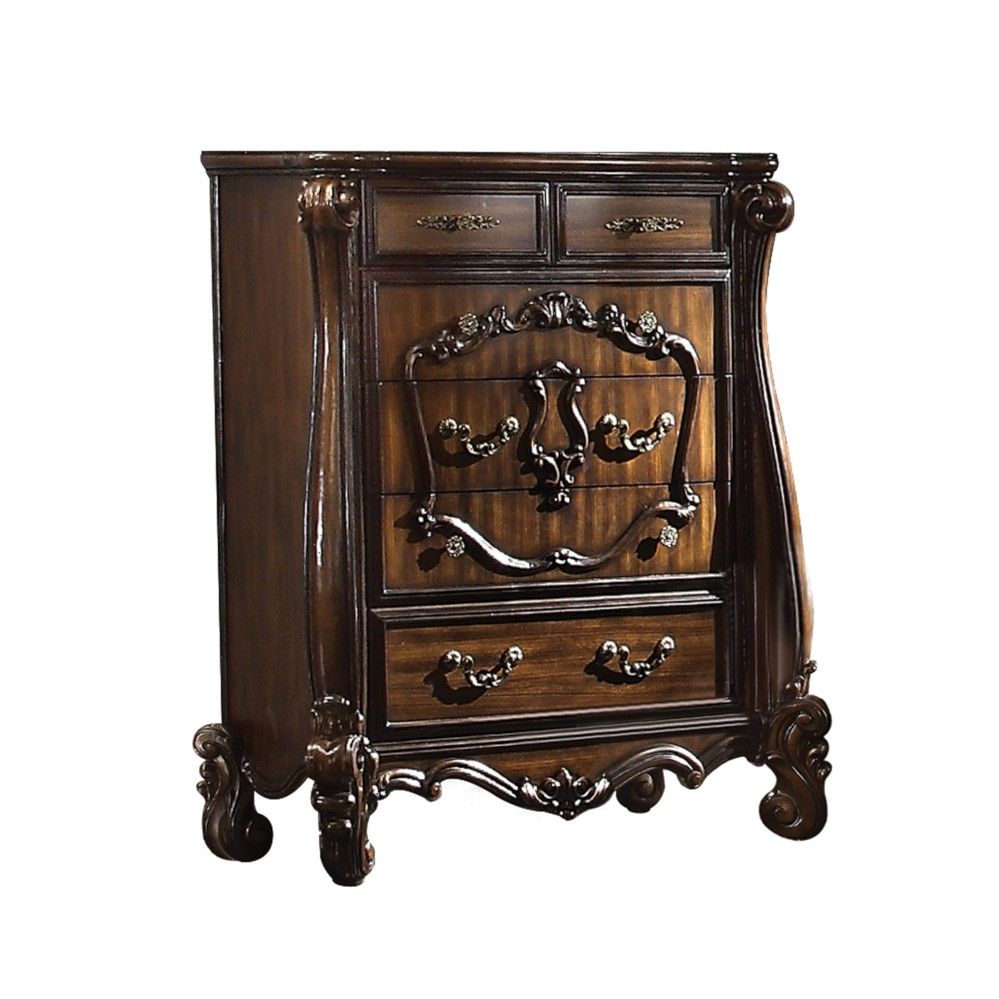 The Versailles chest is the perfect accent to create the style of royalty your bedroom has been needing. This chest crafted in wood with cherry oak finish was inspired by old European design with brown copper metal hardware and intricate wood carvings on 