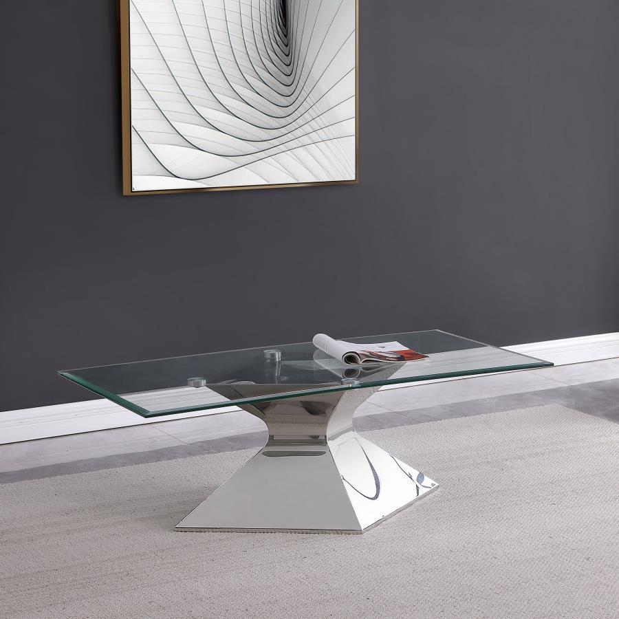 Go bold with this modern coffee table, featuring a polished silver hourglass-inspired pedestal base. Constructed with stainless steel and tempered glass, it includes a rectangular top with a beveled edge for added dimension. The clear glass showcases the 
