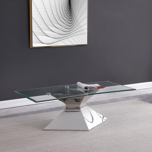  featuring a polished silver hourglass-inspired pedestal base. Constructed with stainless steel and tempered glass