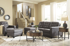This ultra-contemporary set invites you to spread out and make yourself comfortable. Linear track arms offer a clean, sleek aesthetic, while tufted box cushions are a nod to mid-century design. Rest assured, a movable ottoman and reversible seat cushions 