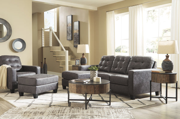 This ultra-contemporary set invites you to spread out and make yourself comfortable. Linear track arms offer a clean, sleek aesthetic, while tufted box cushions are a nod to mid-century design. Rest assured, a movable ottoman and reversible seat cushions 