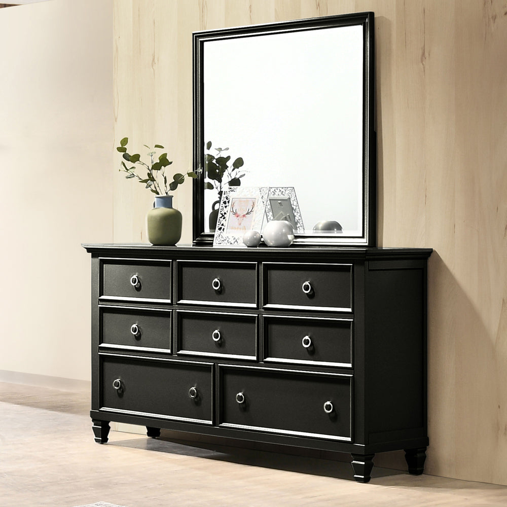 The Tamarack 8 Drawer Dresser and Mirror in Black is a perfect blend of durability and elegance. Crafted with a combination of solid poplar, basswood veneers, and eco-friendly manufactured wood, this set ensures strength and long-lasting durability. Its v