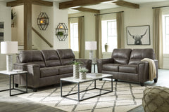 Everyone can have the best seat in the house with this sofa and loveseat. An indulgent choice with deep seats crafted for cloud-like softness, this set is the ideal merger of modern flair and classic staying power. <h4><b>Navi - Smoke - Sofa</b></h4> <tab