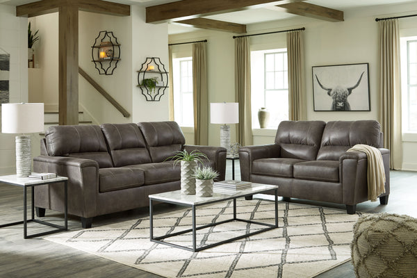 Everyone can have the best seat in the house with this sofa and loveseat. An indulgent choice with deep seats crafted for cloud-like softness, this set is the ideal merger of modern flair and classic staying power. <h4><b>Navi - Smoke - Sofa</b></h4> <tab