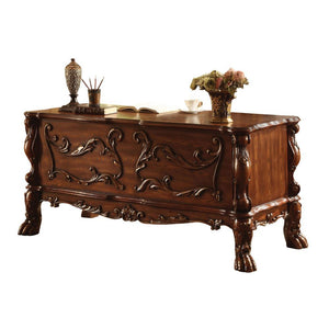 The Dresden executive desk classic style will blend masterfully in your home. Carefully constructed from selected wood and veneers in rich Cherry Oak Finish. Highly decorative details, oversized crown, claw feet and decorative scrolled moldings give this 