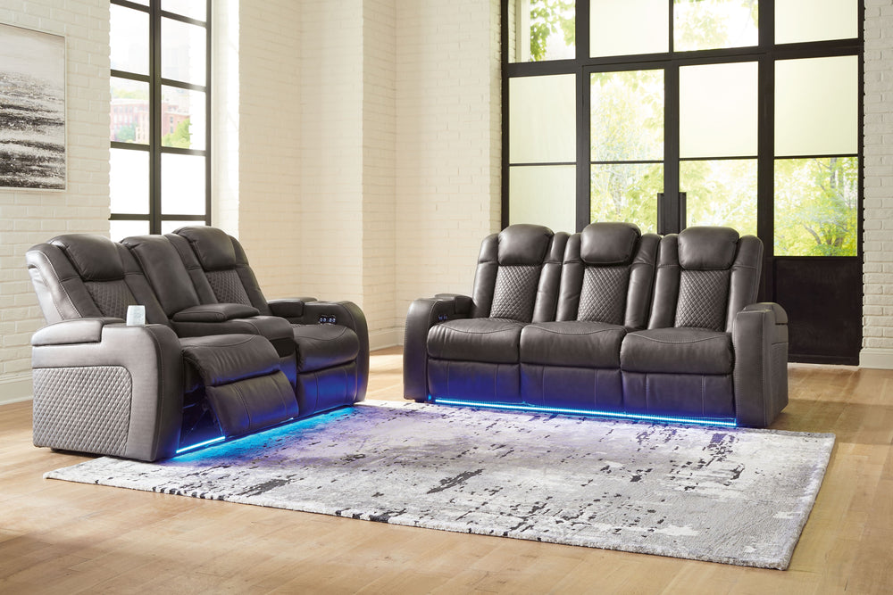 This power reclining living room set goes beyond basic comfort. It upgrades the everyday, turning your living room into an entertainment hub. Donâ€™t want to leave your seat? Keep essentials in reach with assorted charging options, cup holders and storage