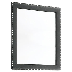 This gorgeous mirror is a masterpiece made for royalty, ready to perk up your sleeping space. Its admirable frame is upholstered entirely in gorgeous velvet fabric. Nail head trim surrounds the frame for a sleek and exquisite upgrade. Place this mirror on